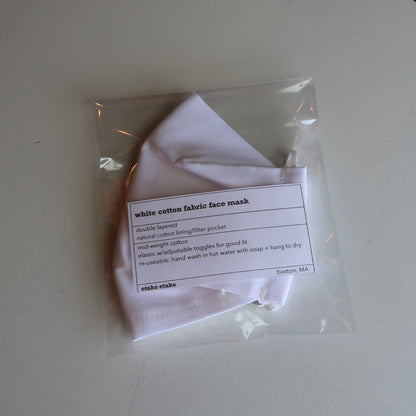 white cotton fabric face mask